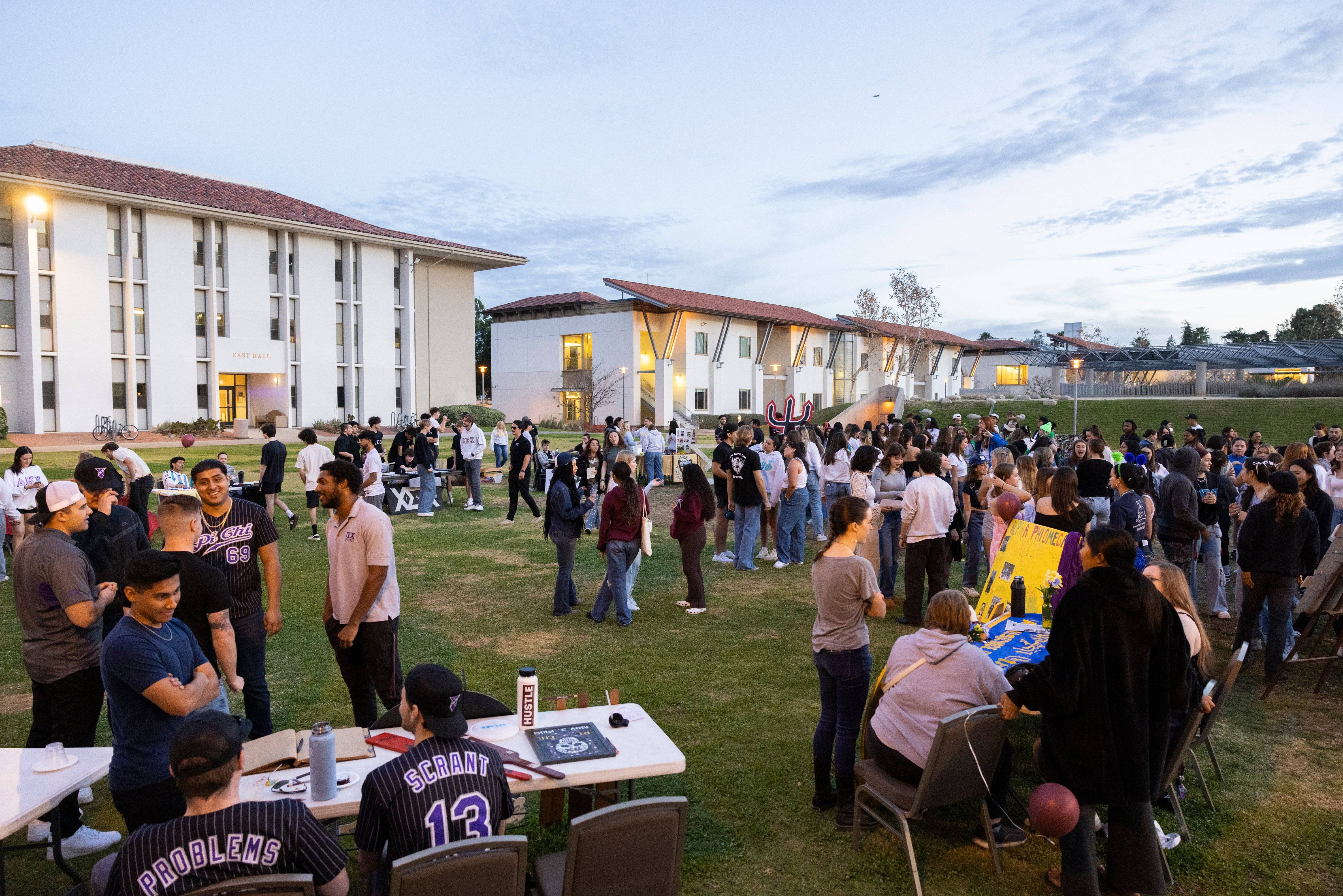 a group of people outside a building