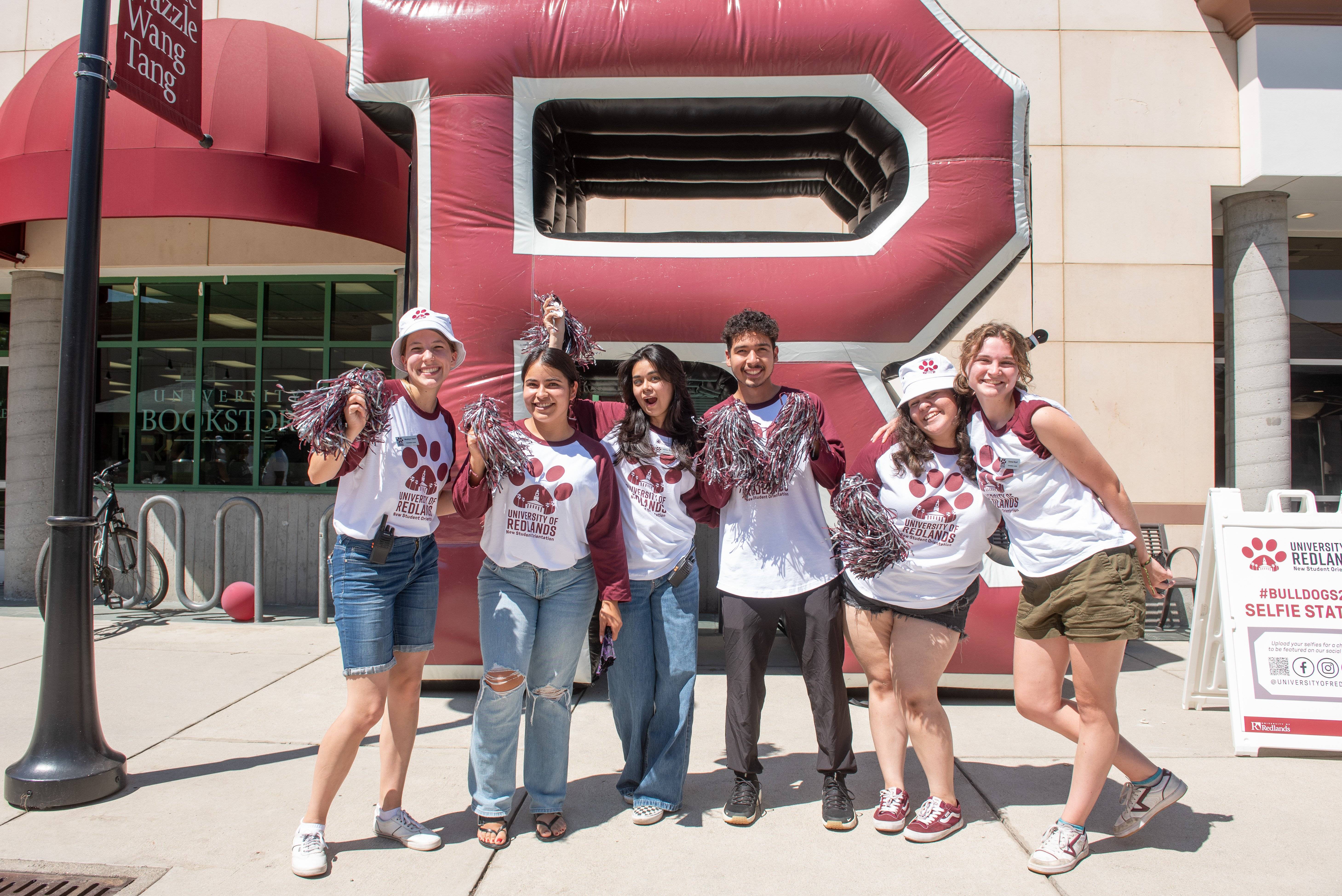 a group of people posing for a photo