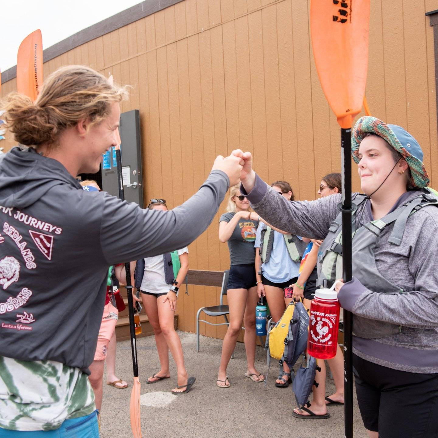 a group of people shaking hands