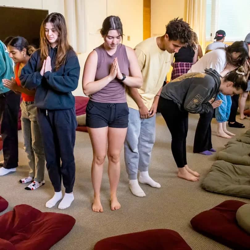 a group of people standing in a line