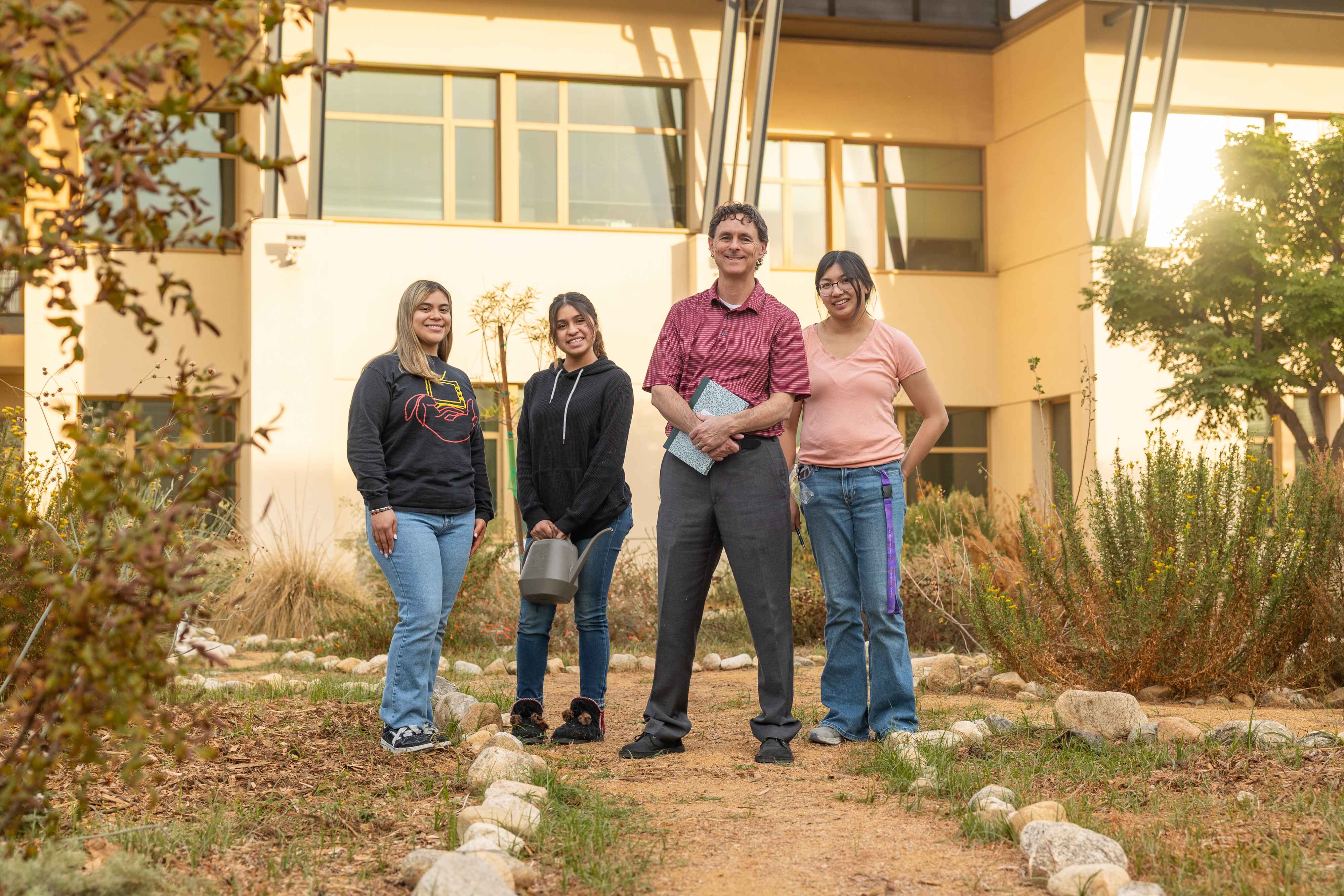 a group of people standing in front of a building