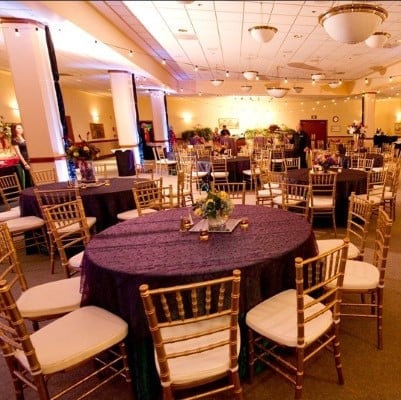 a room with tables and chairs