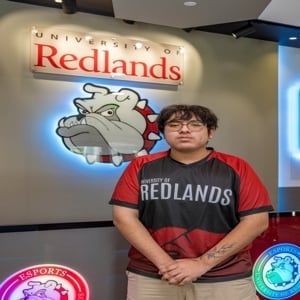 a man standing in front of a sign