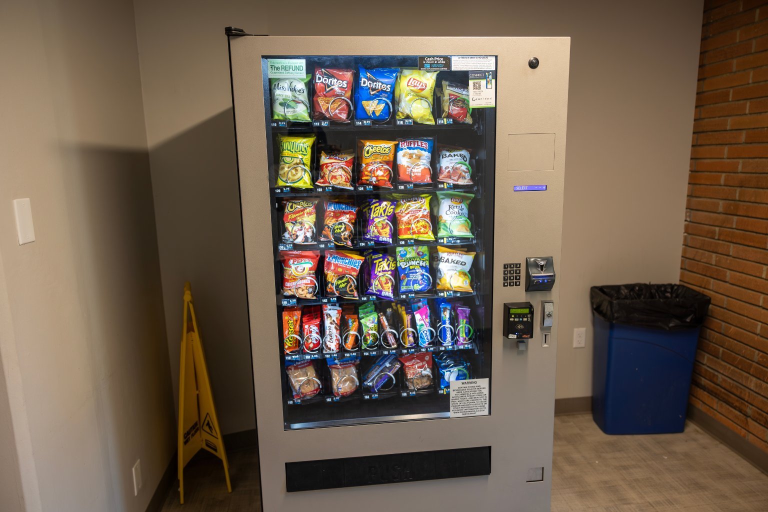 a vending machine with snacks on it