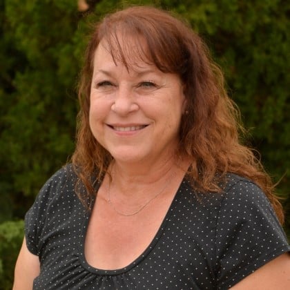 a woman smiling at the camera