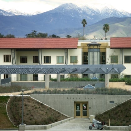 a building with a mountain in the background