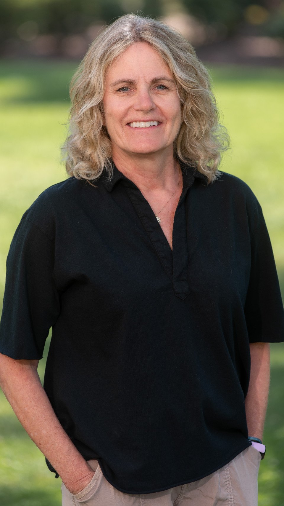 a woman smiling at camera