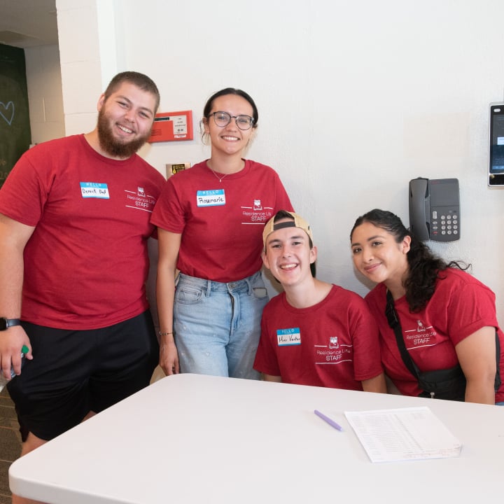 a group of people posing for a photo