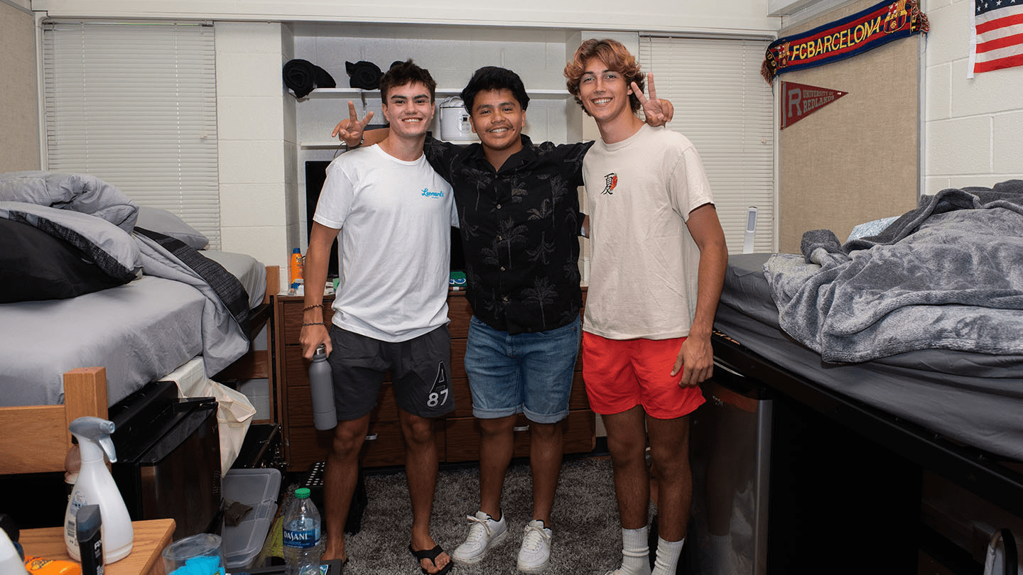 a group of men posing for a picture