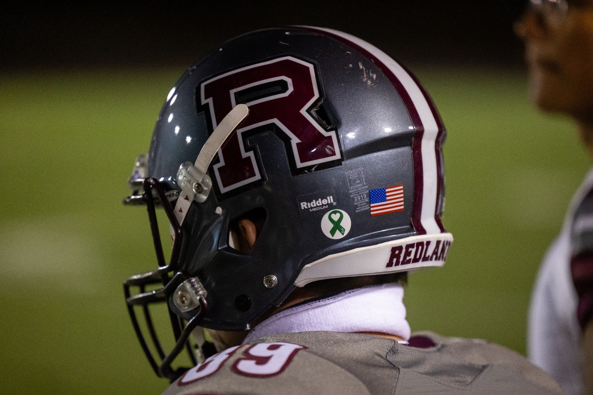a football player wearing a helmet