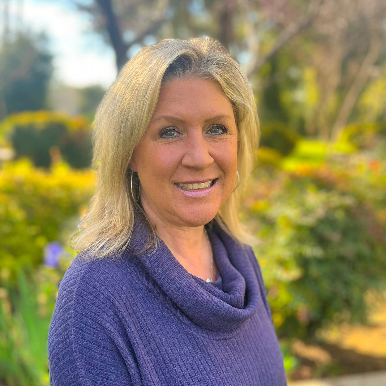 a woman smiling at camera