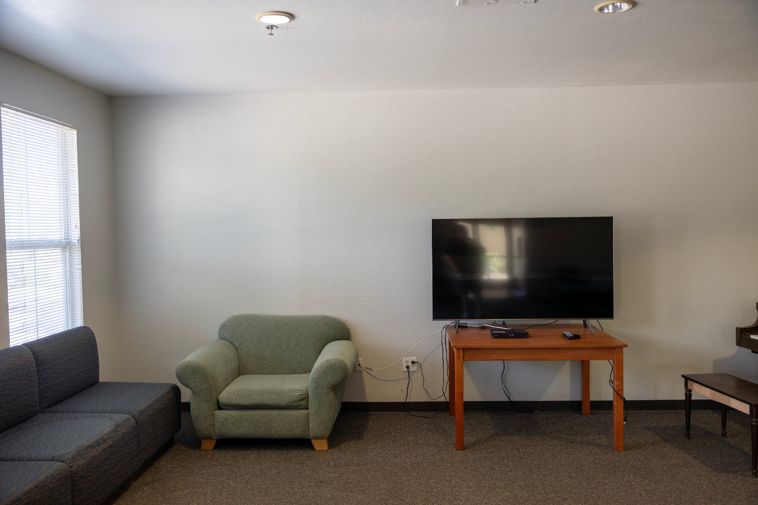 a tv on a table in a room