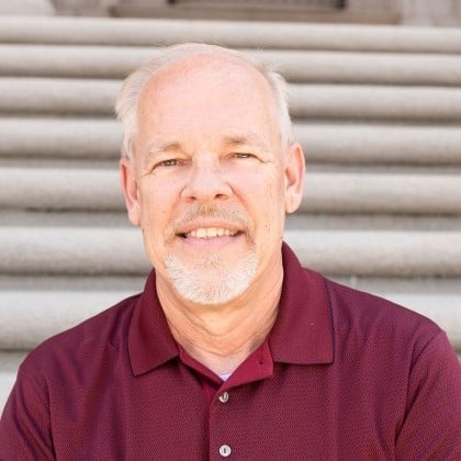 a man in a red shirt