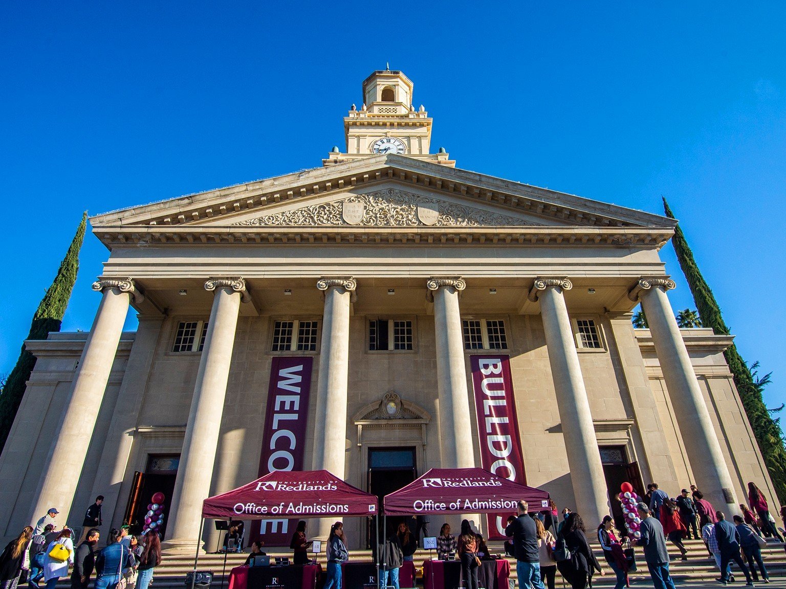 a group of people outside of a building