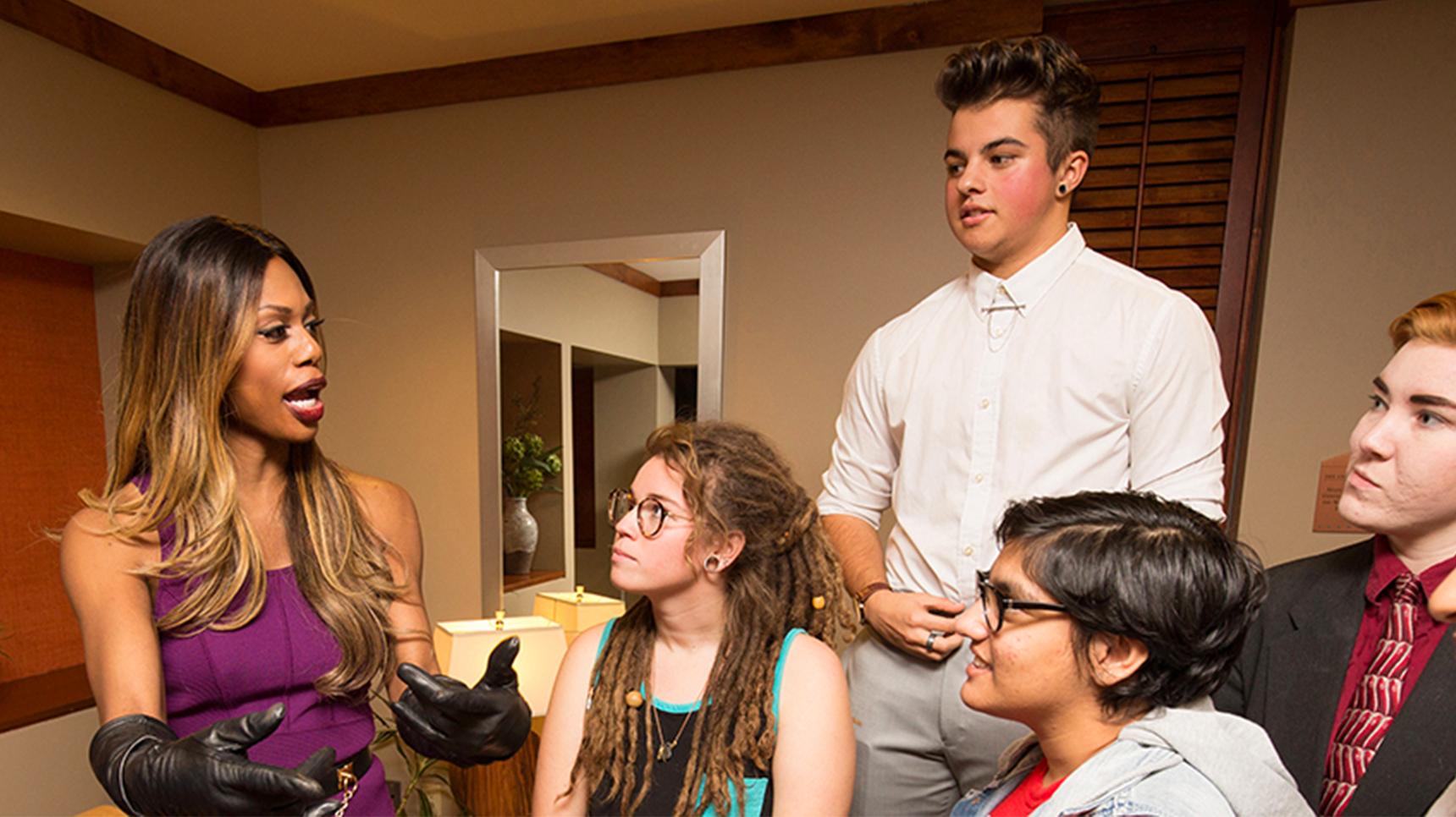 a group of people standing in a room