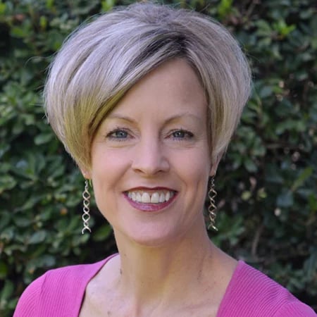 a woman smiling for a picture