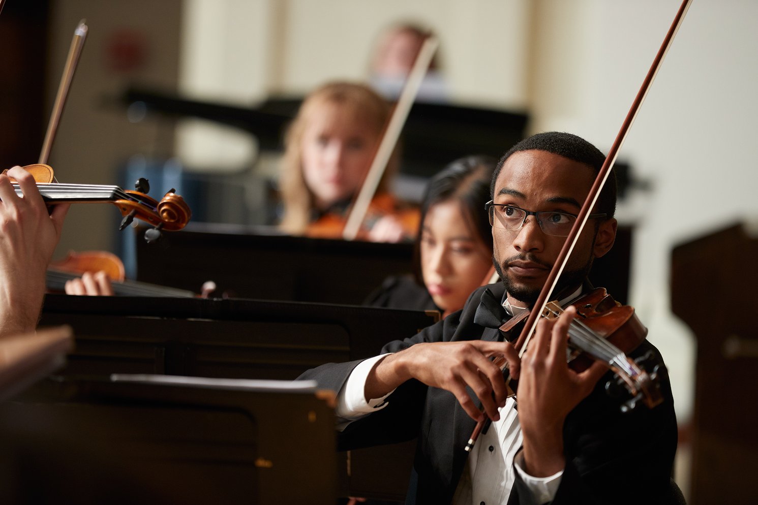a man playing a violin