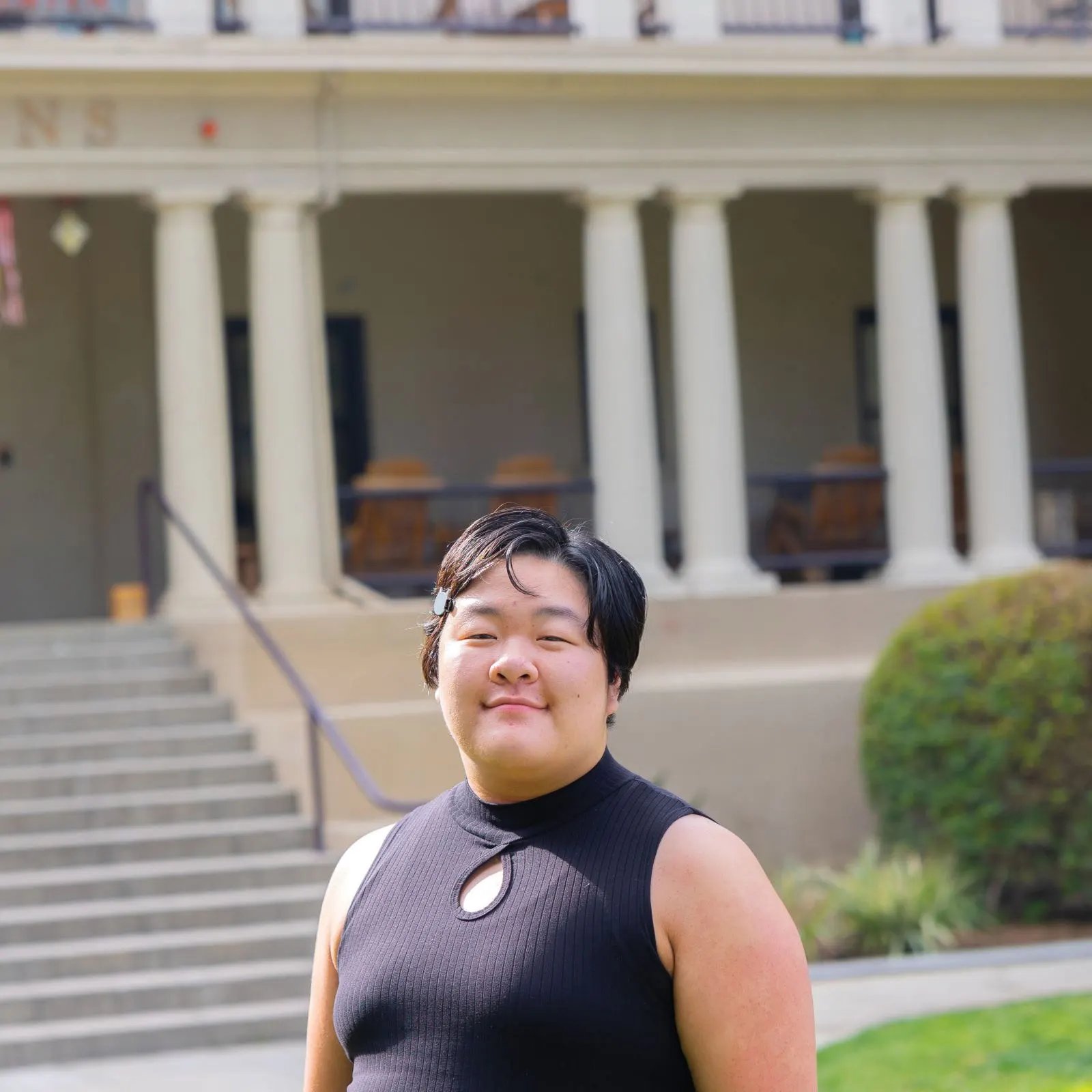 a woman in a black dress