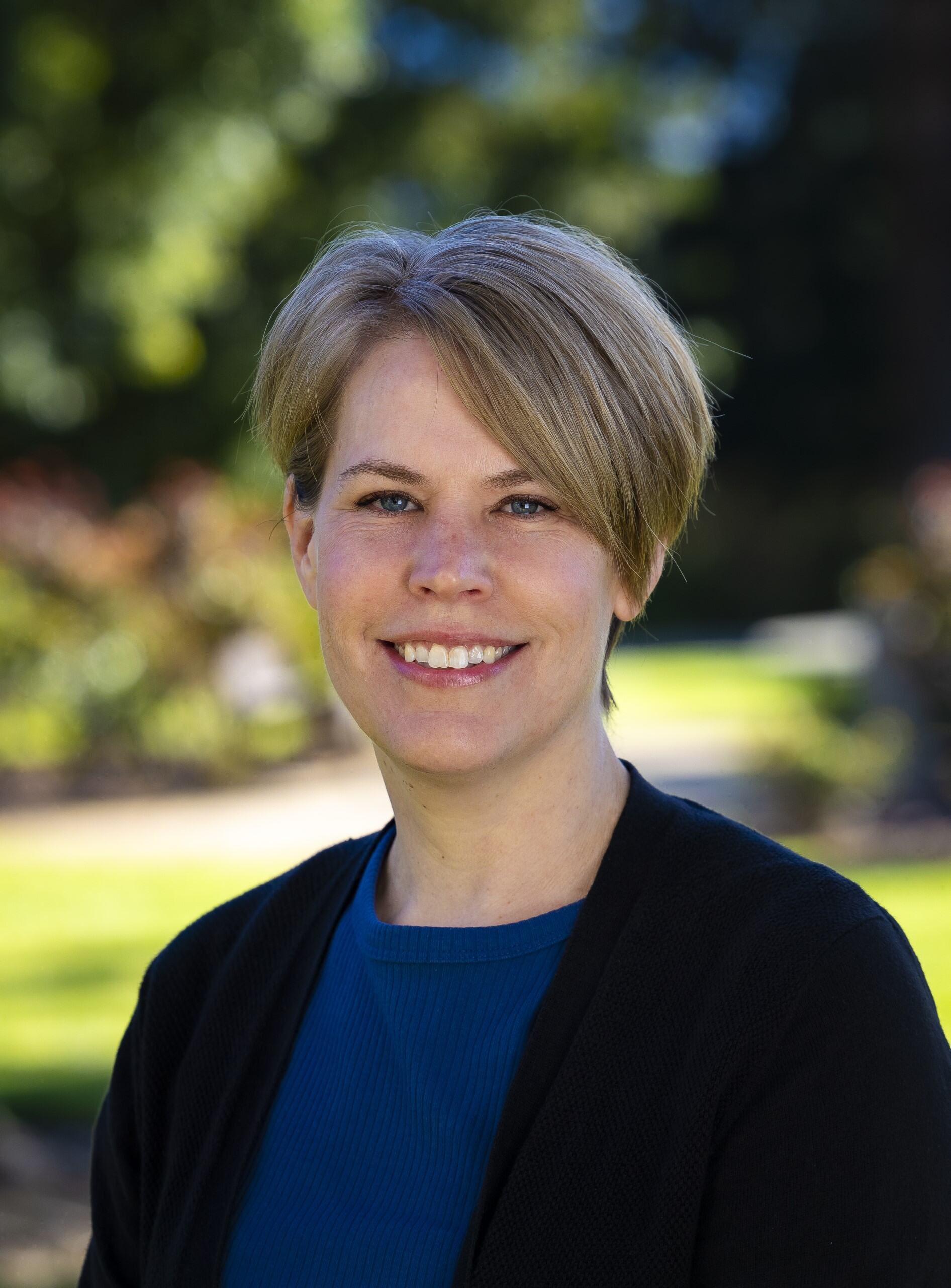a woman smiling for a picture