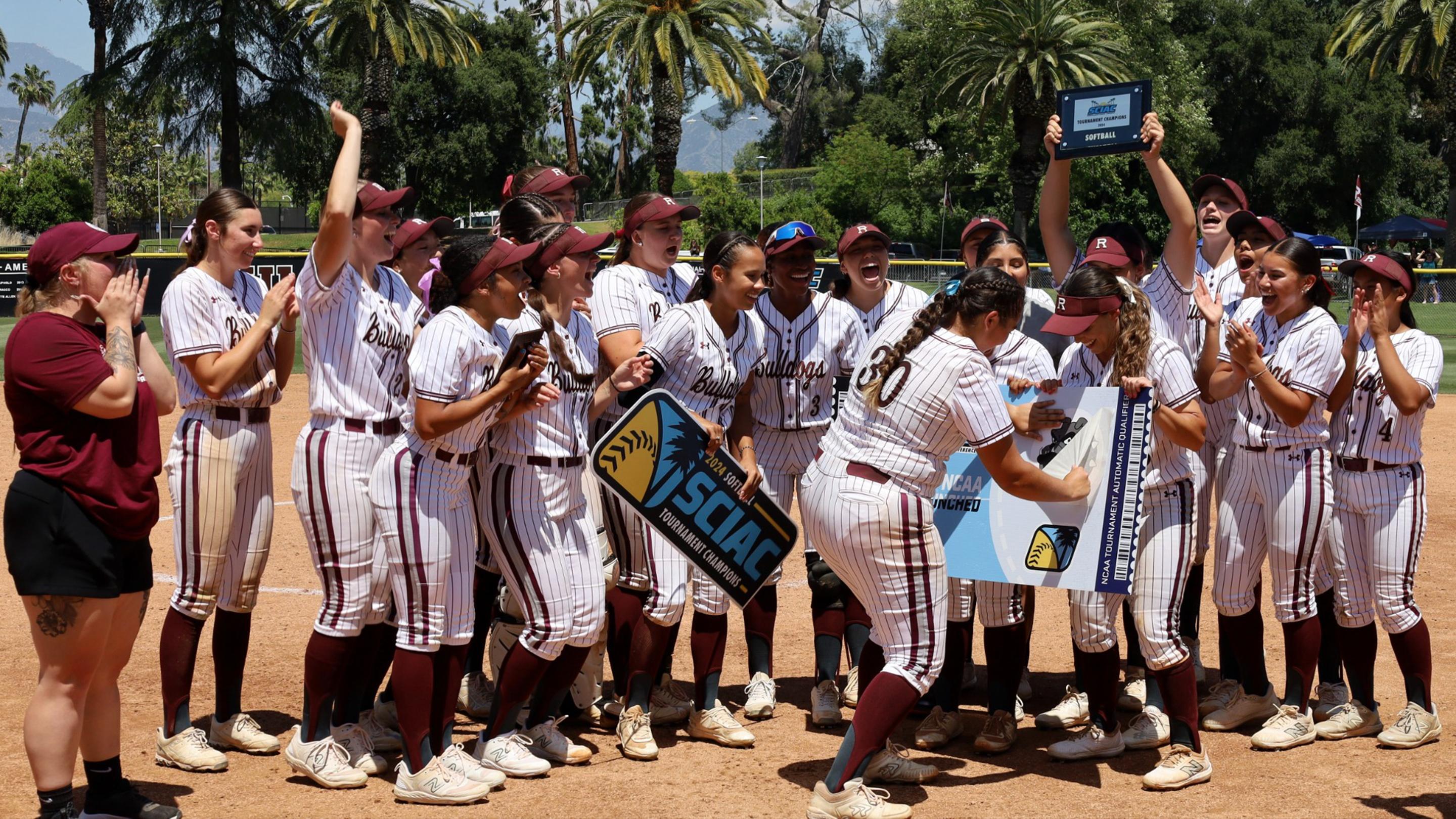 a group of women in baseball uniforms
