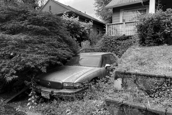 a car parked in a yard