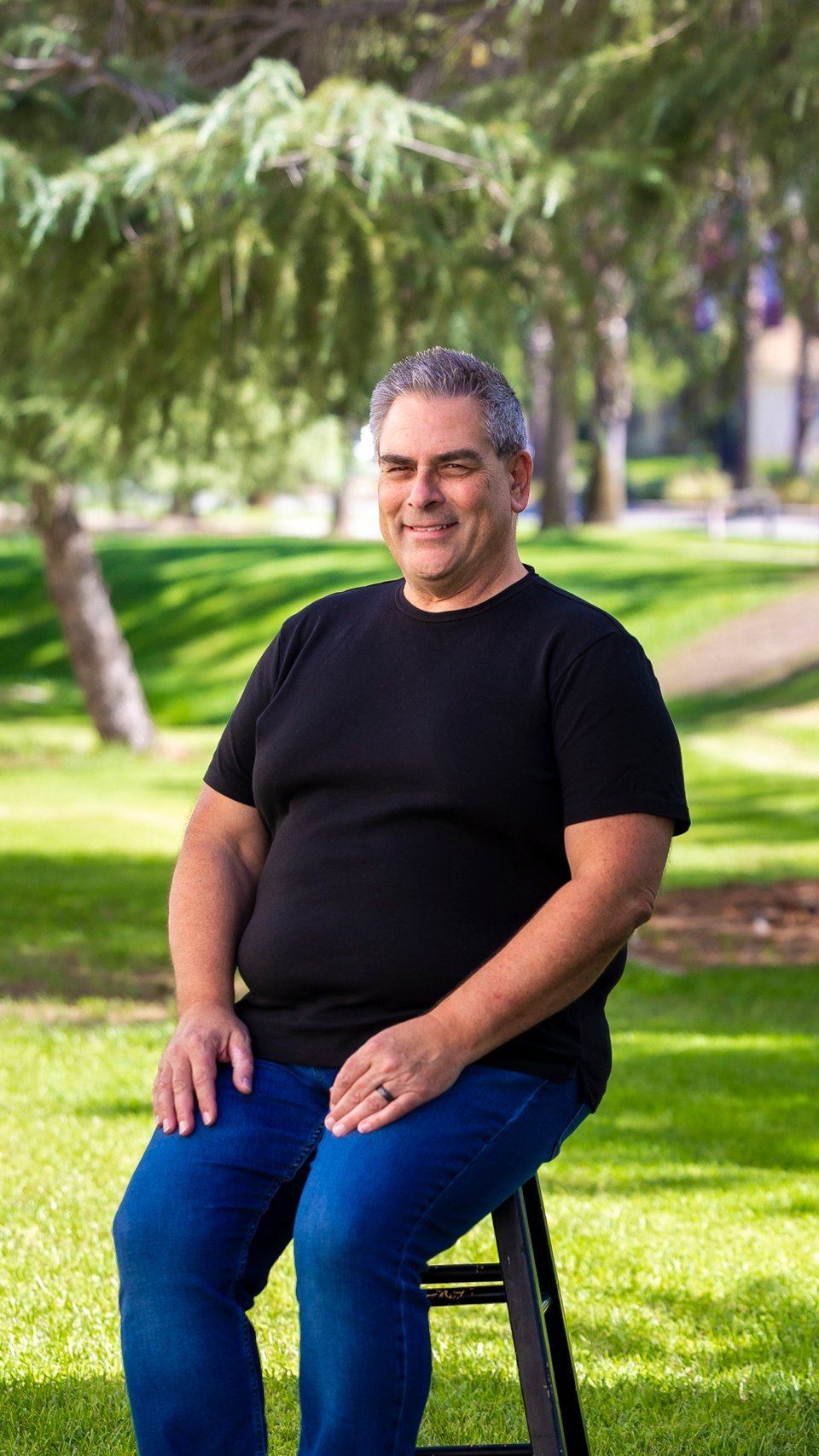 a man sitting in a park