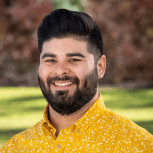 a man smiling for a picture