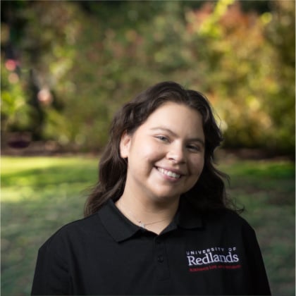 a woman smiling at camera