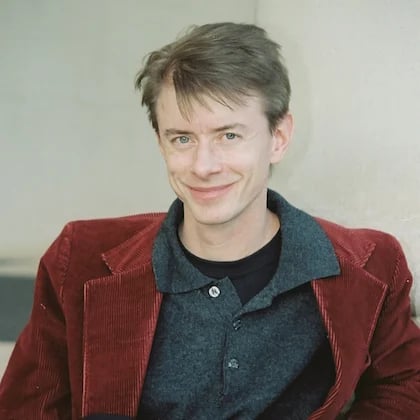 a man in a red jacket