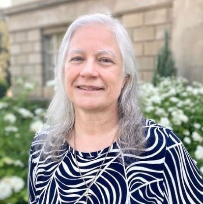 a person with long gray hair