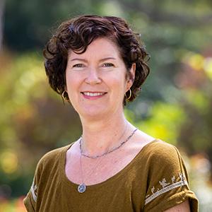 a woman smiling for a picture