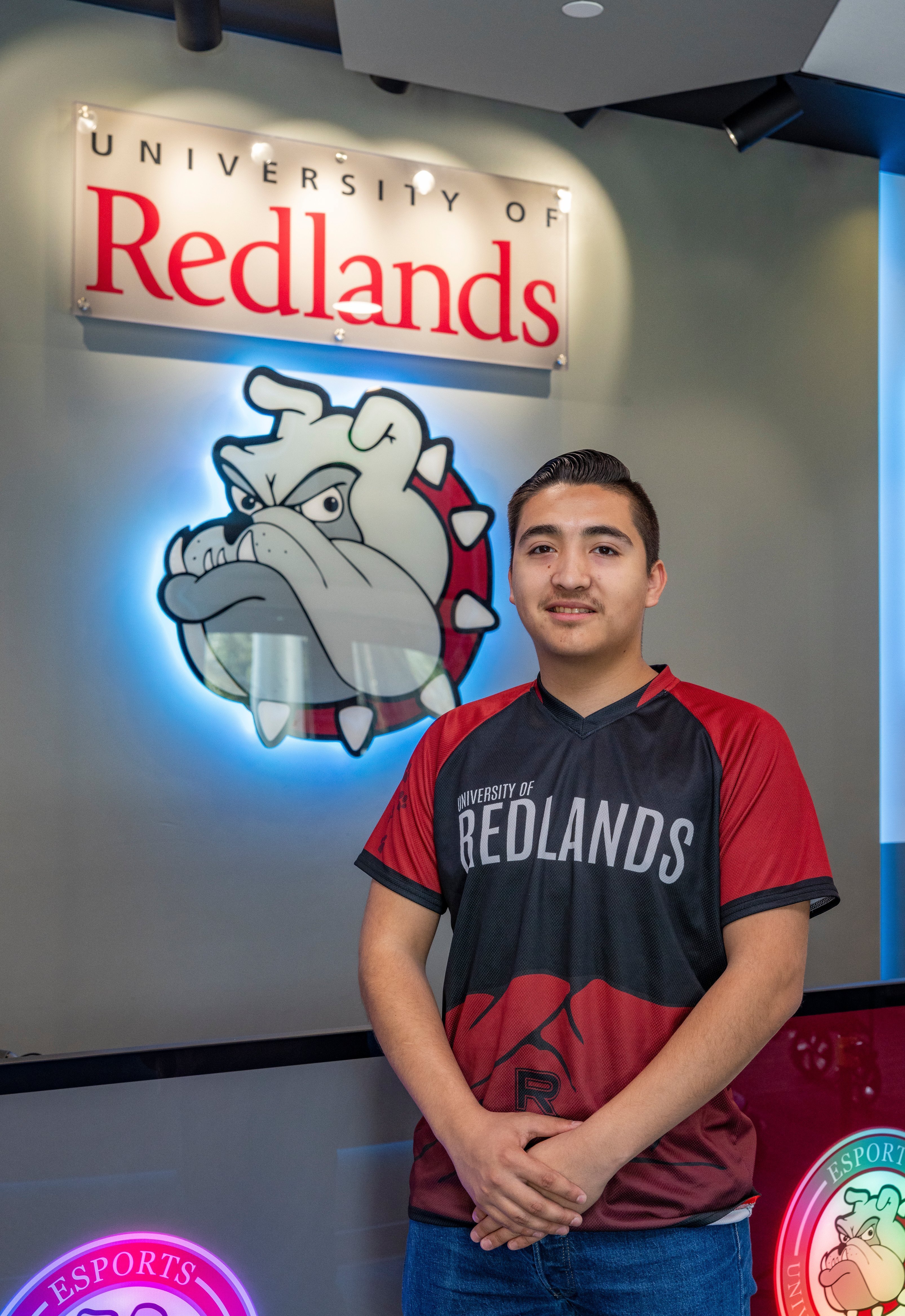 a man standing in front of a sign
