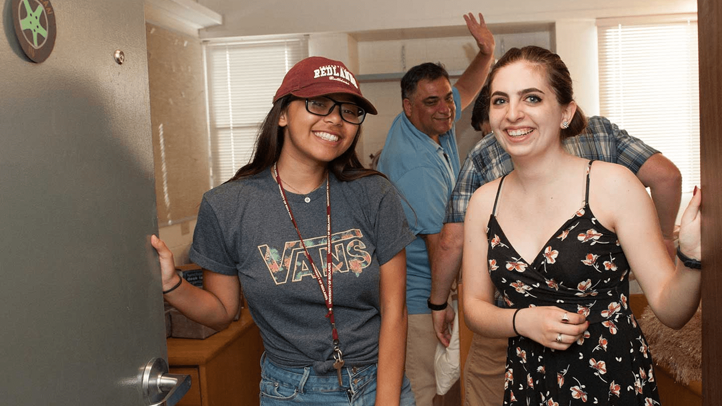 a group of people standing in a room