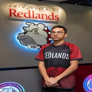 a man standing in front of a sign
