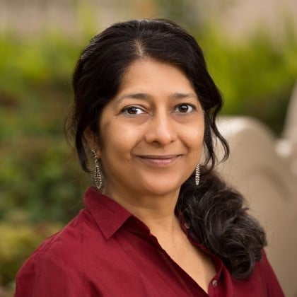 a woman smiling at the camera