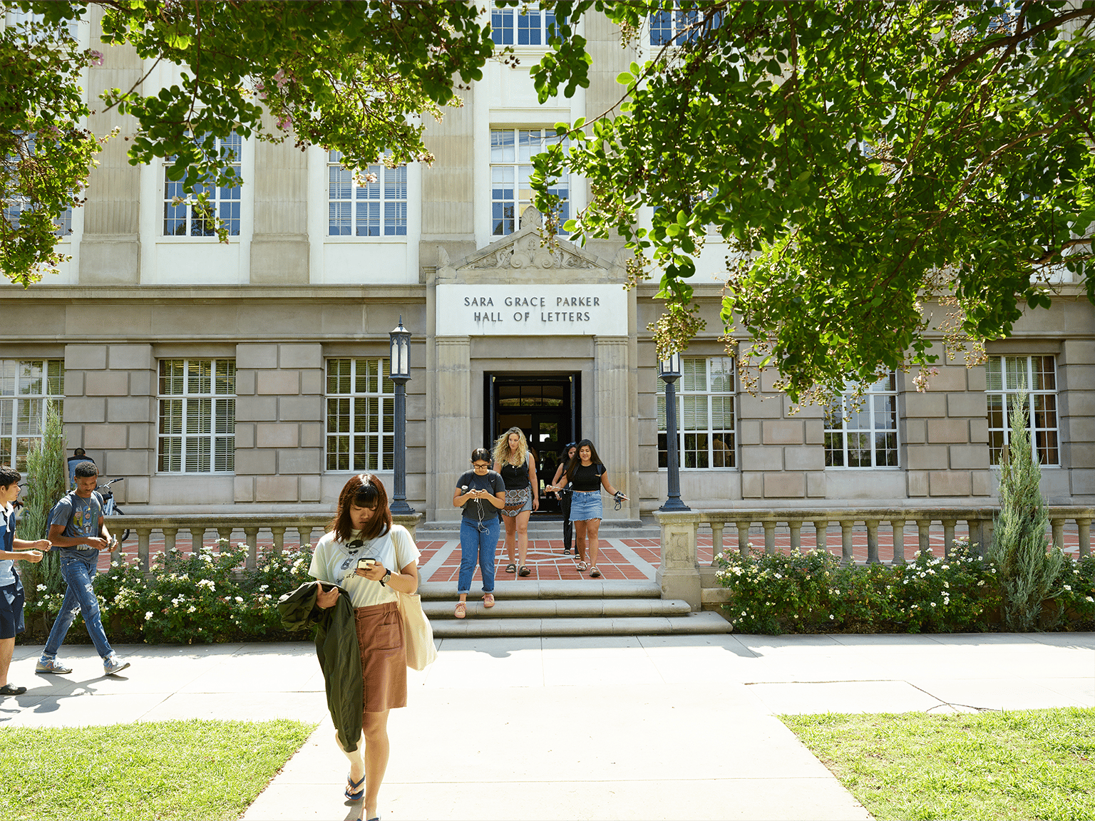 a group of people outside of a building