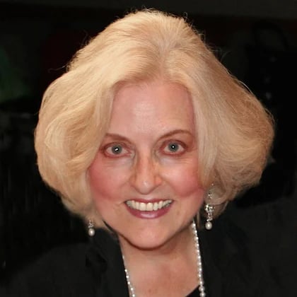 a woman smiling at camera