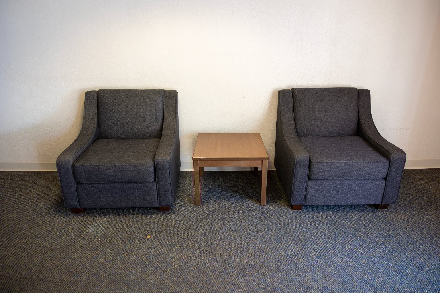 two chairs next to each other