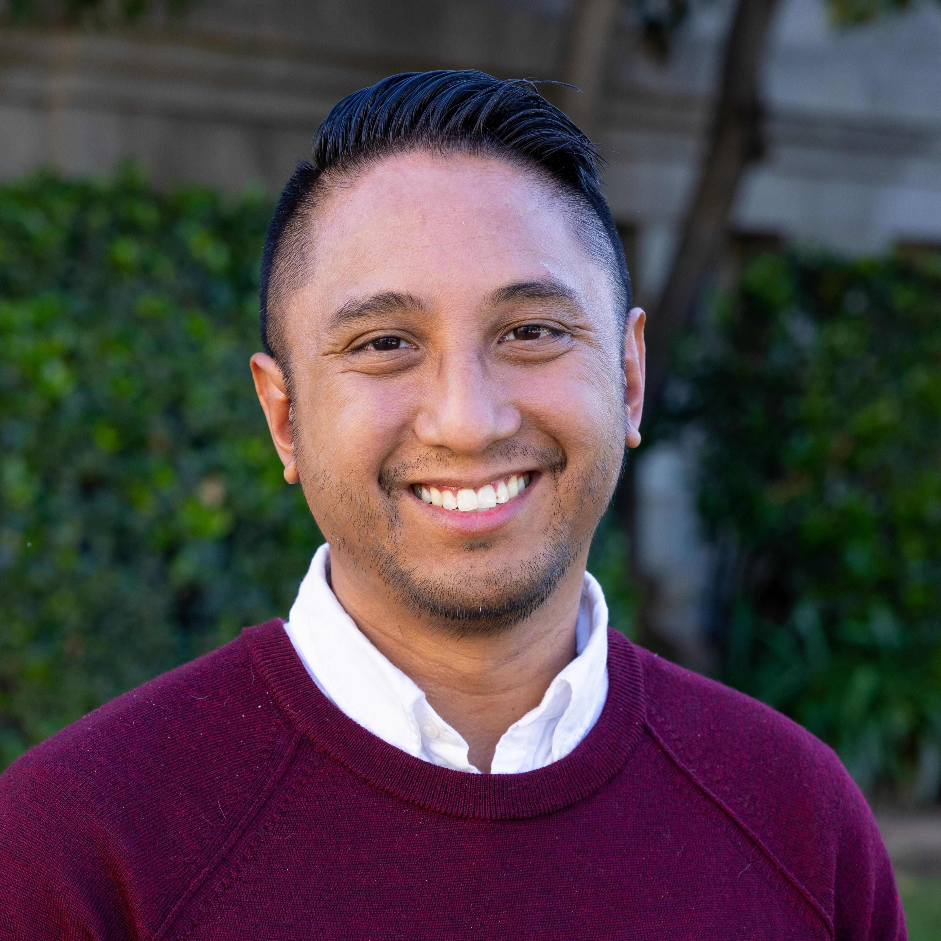 a person smiling for a picture