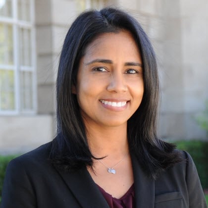 a woman smiling for a picture