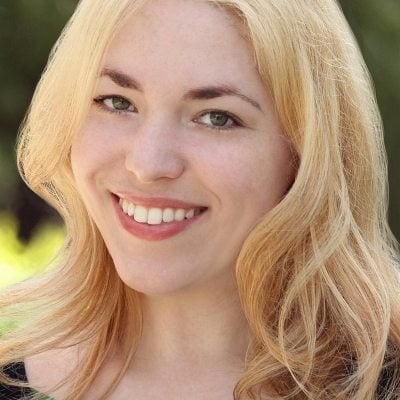 a close-up of a woman smiling