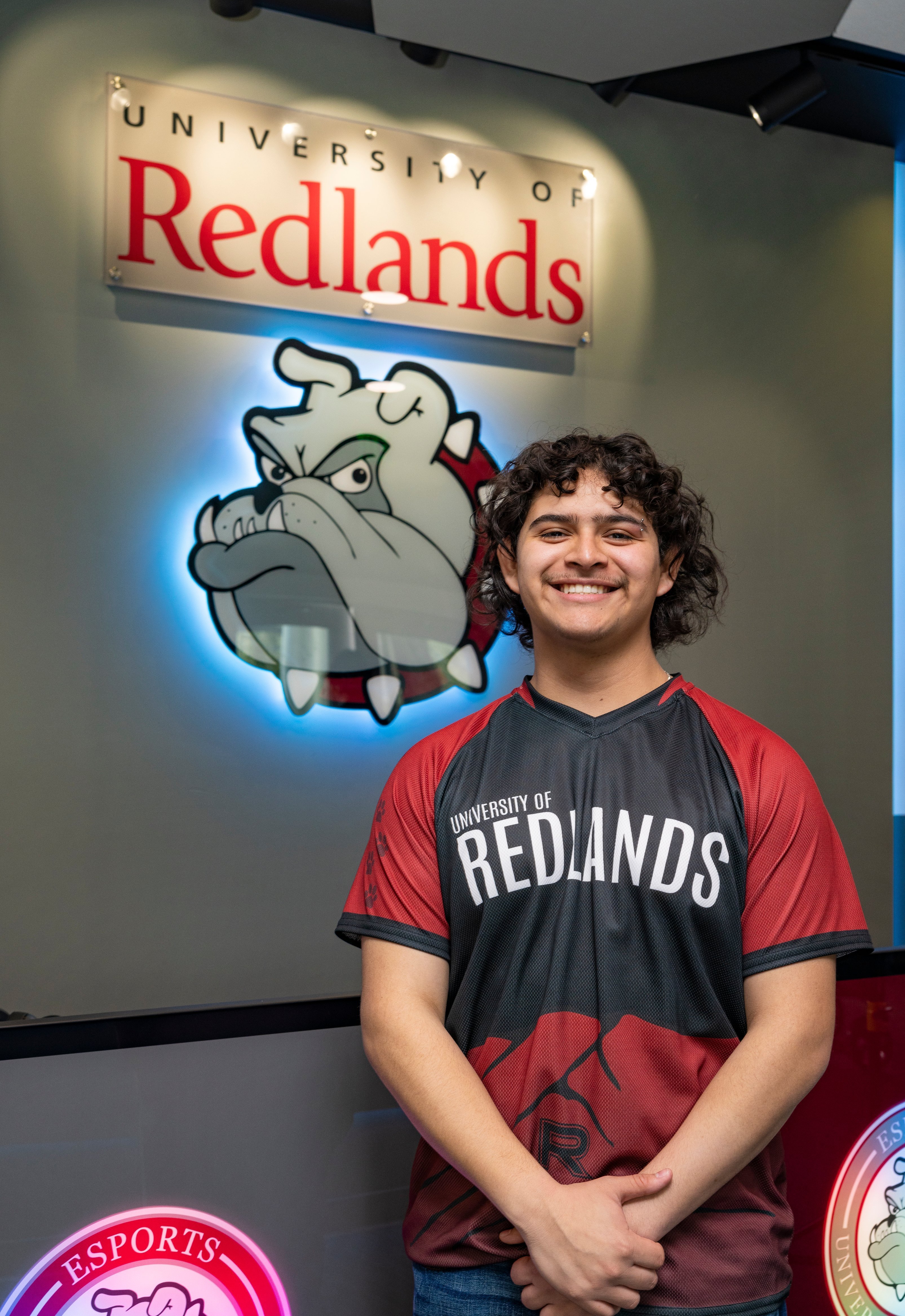 a man standing in front of a sign