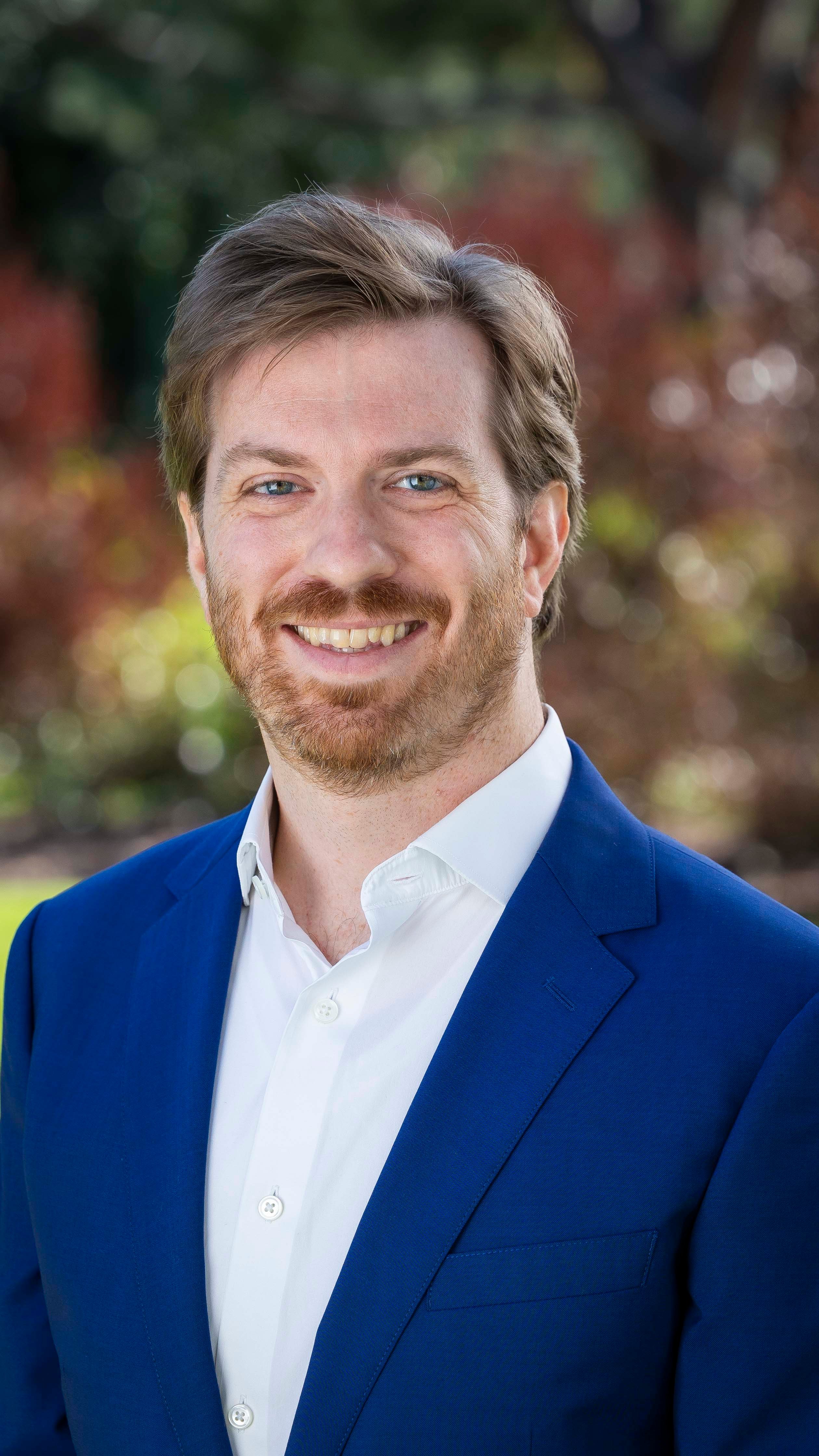 a man in a blue suit