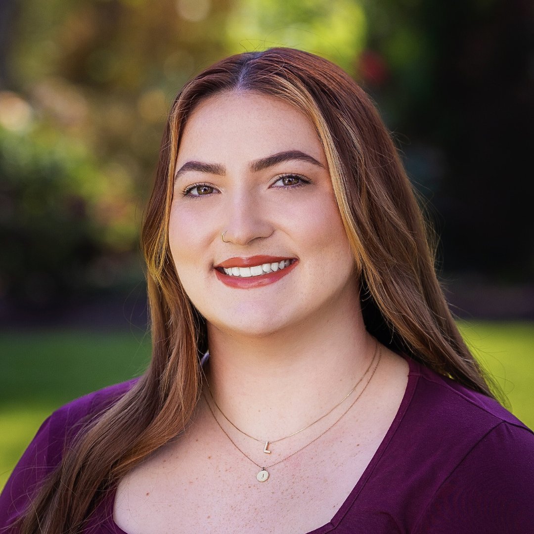 a woman smiling at camera