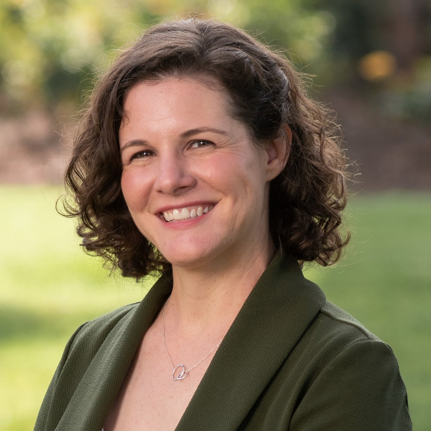 a woman smiling for the camera