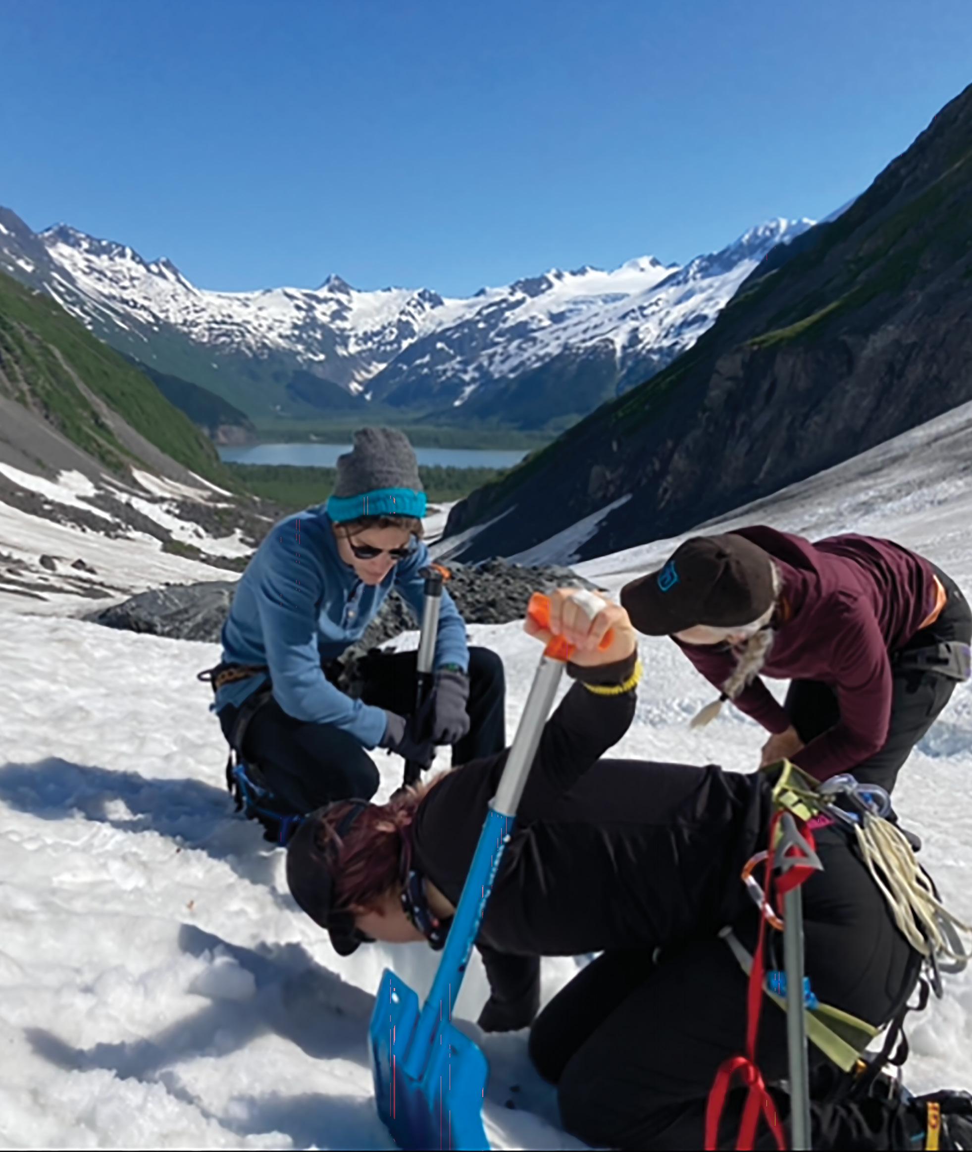a group of people on a snowy mountain