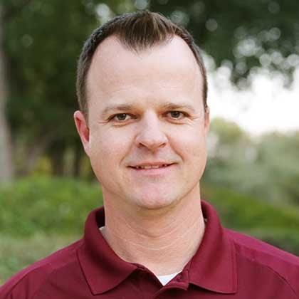 a man in a red shirt