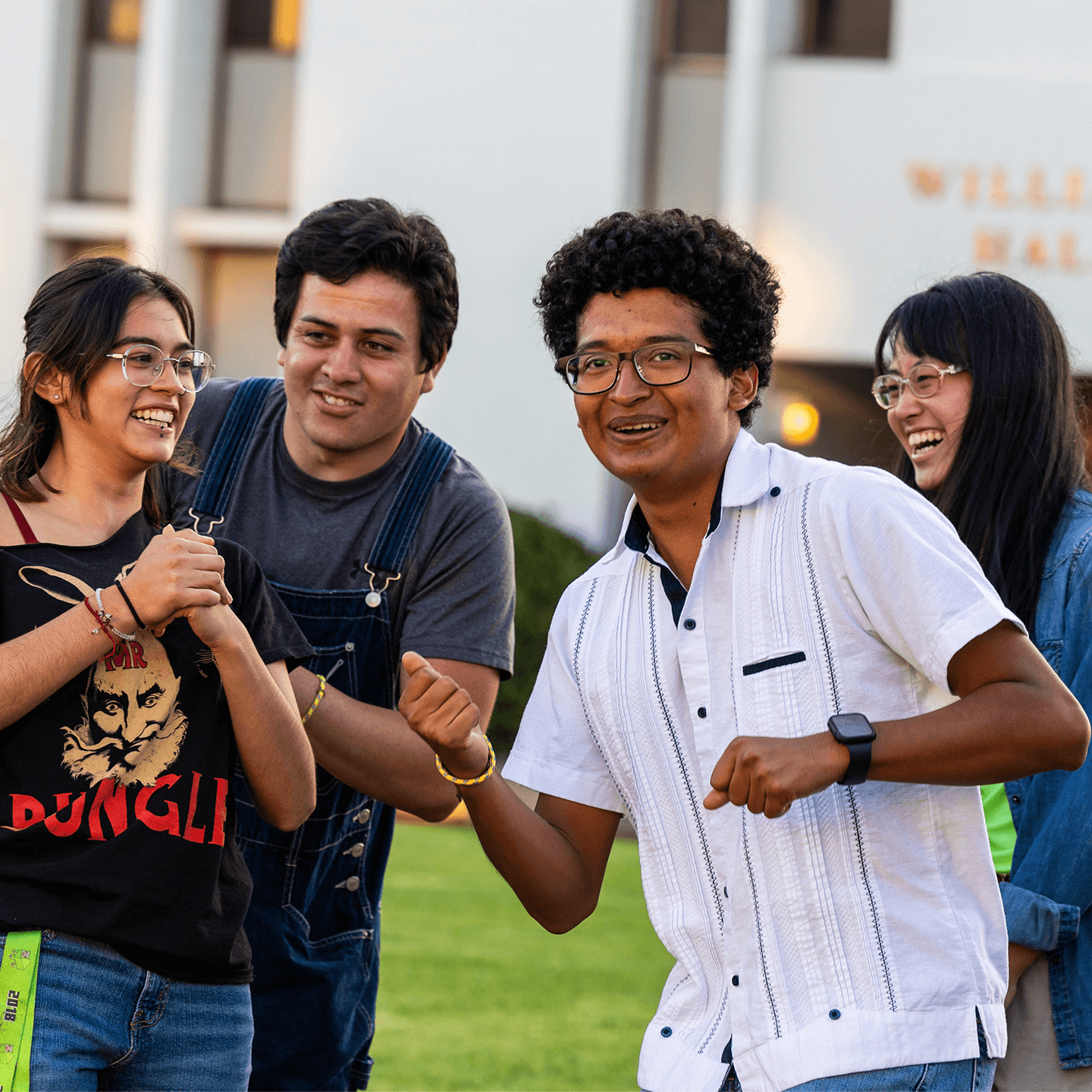 a group of people holding hands