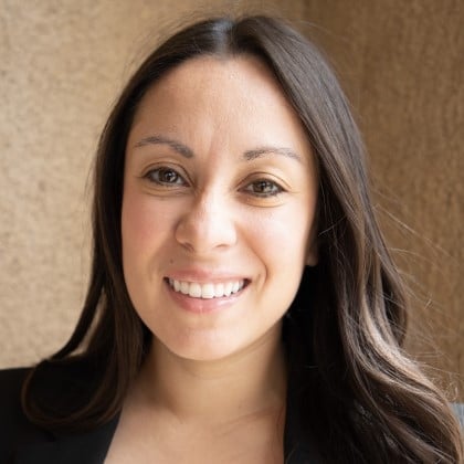 a woman smiling at the camera
