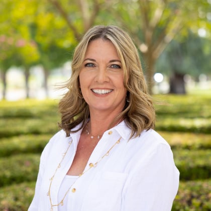 a woman smiling at camera